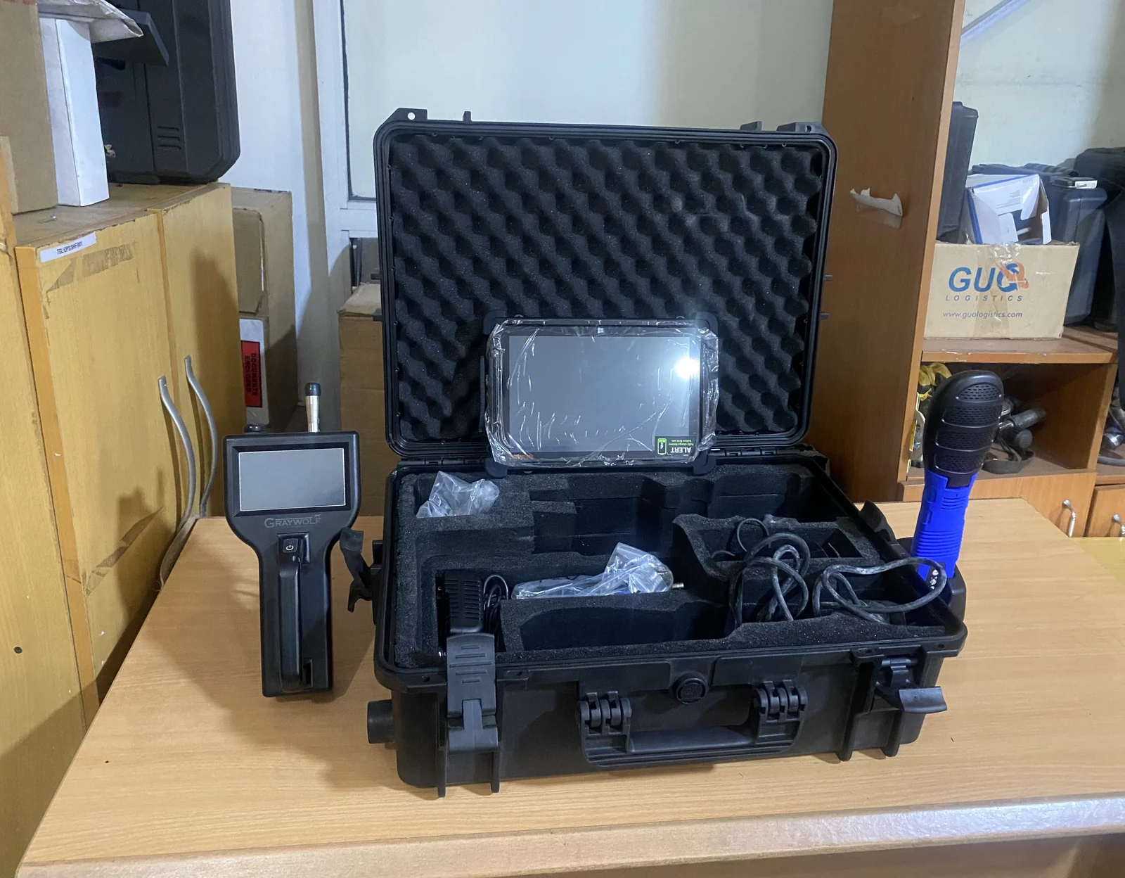 GreyWolf sensing instruments, tablet and probe arranged with their open mobile laboratory case
